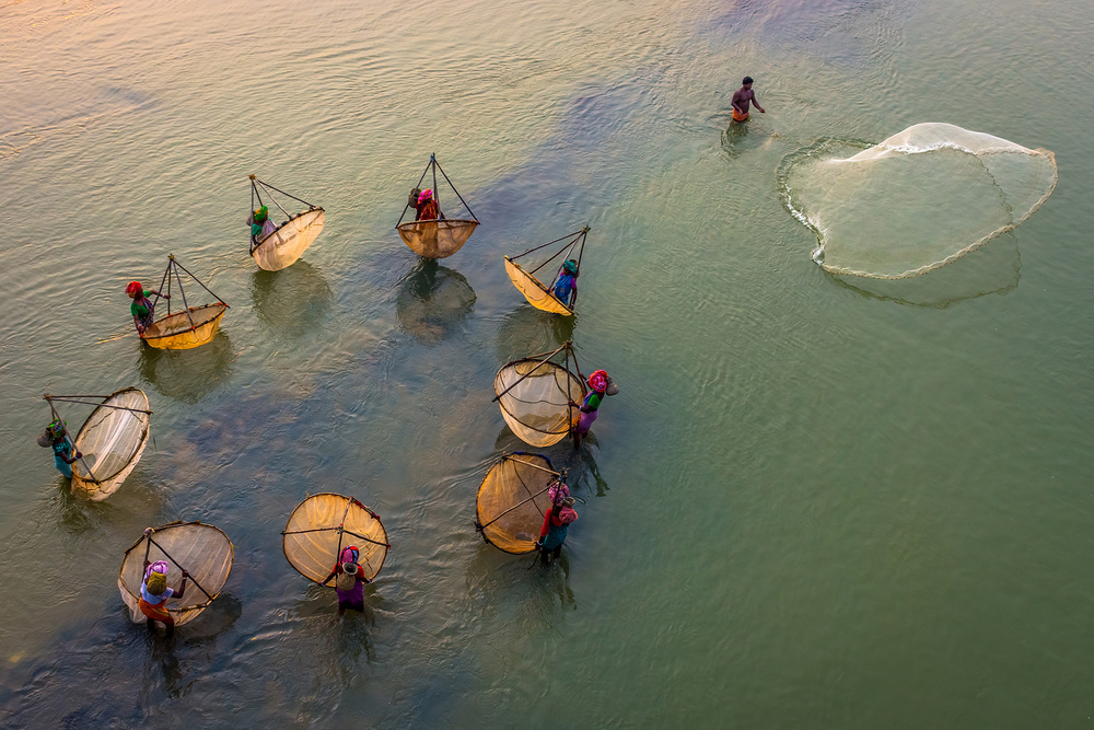 Fisher Women Catching Fishes from Saurabh Sirohiya